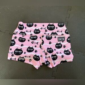 Rok the Box booty shorts, M.